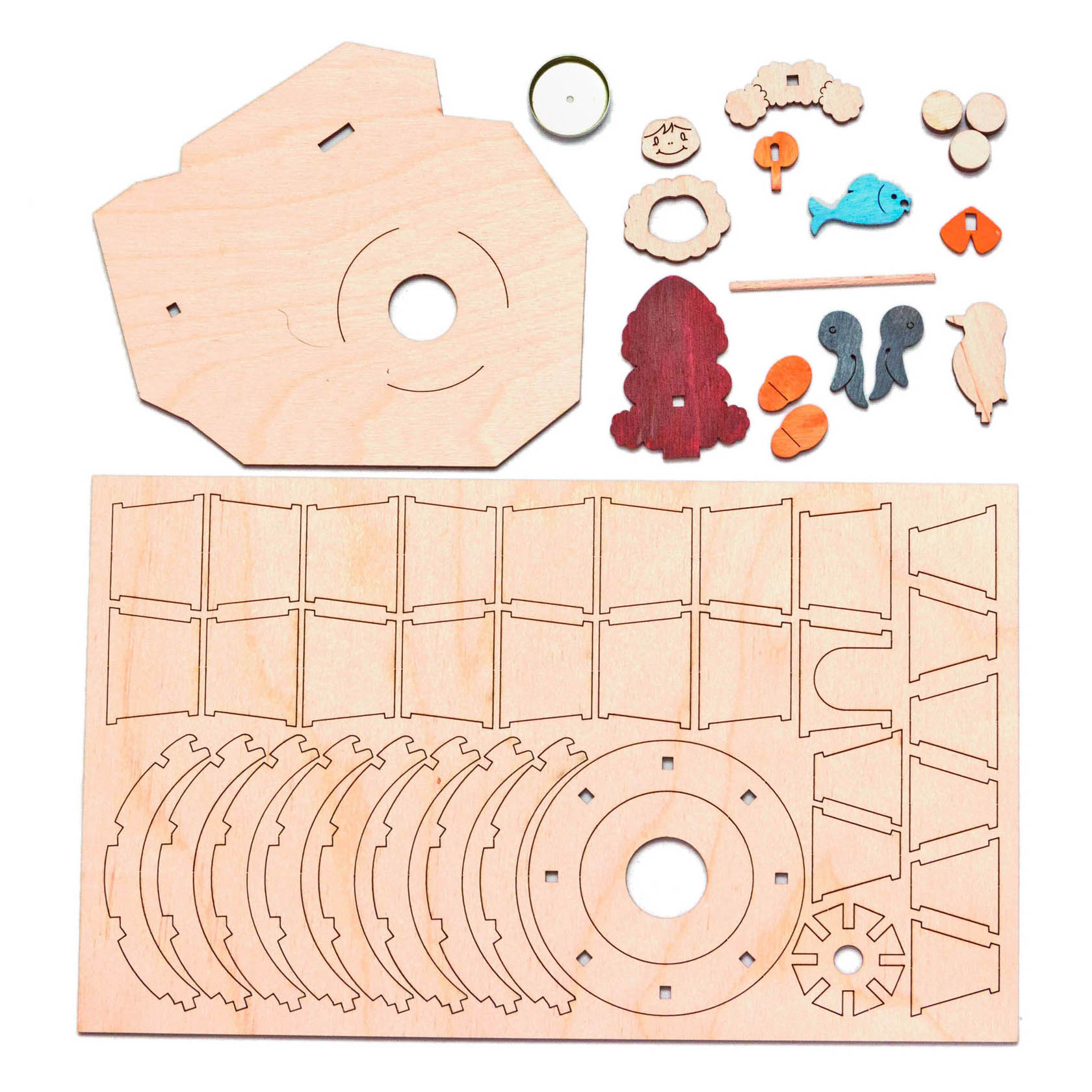 Bastelset für ein Räucherhaus in Igluform. Enthält vorgefertigte Holzteile und kleine bunte Figuren, darunter Pinguine, ein Fisch und ein Weihnachtsmann.