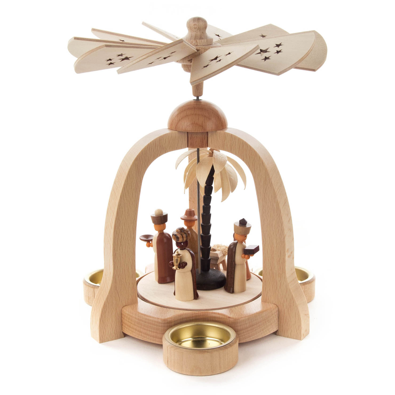A small natural wood Christmas pyramid with a nativity scene under arches, featuring figurines of Mary, Joseph, baby Jesus, shepherds, an angel, and a palm tree.