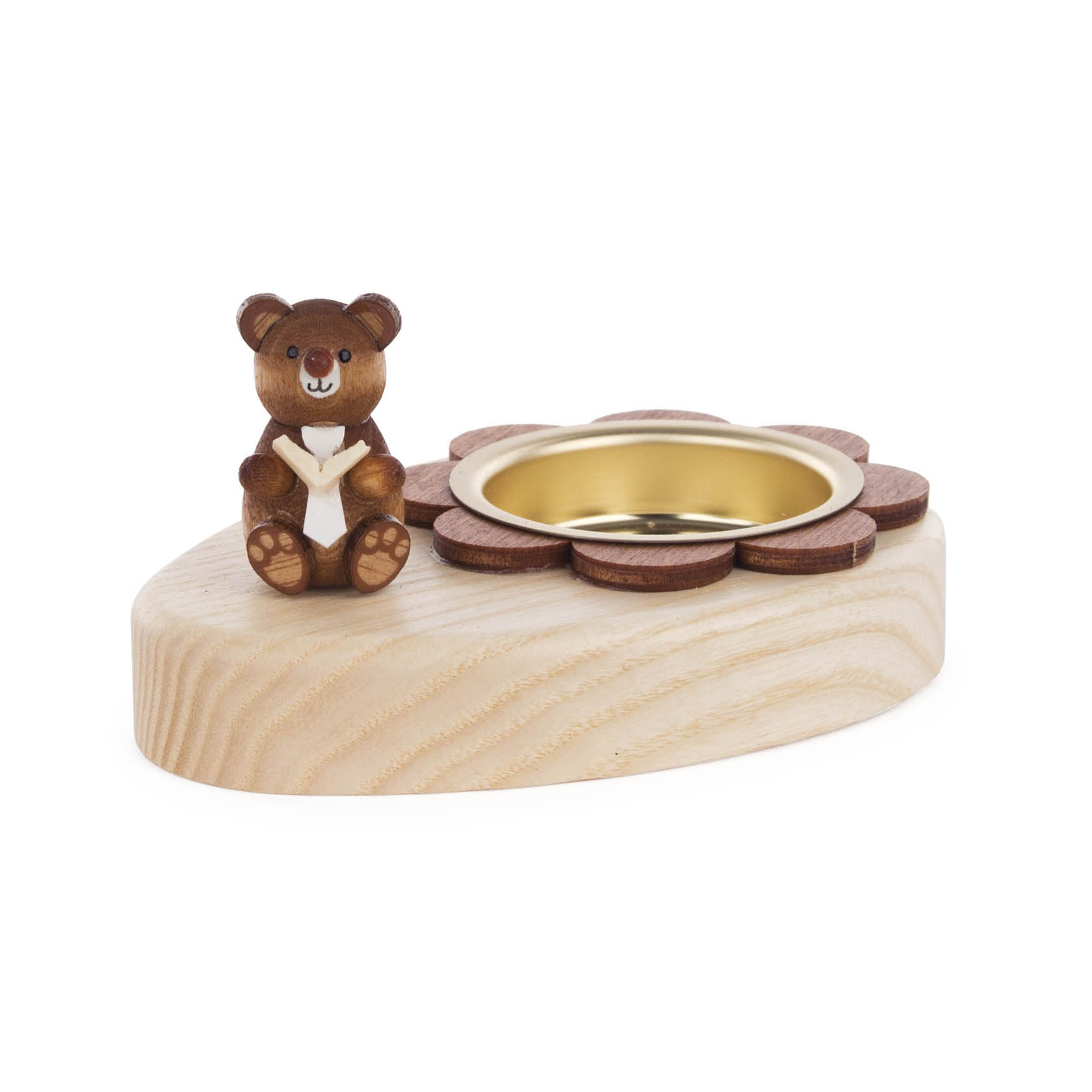 A wooden tealight holder with a small teddy bear figure holding a book, sitting next to the holder.